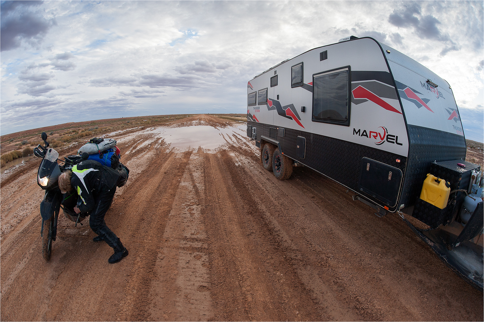 Wipeout at a washout we stopped to help the rider o0n the Birdsville Track north of Mungerannie
